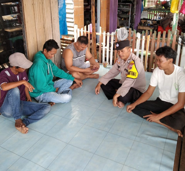 Bhabinkamtibmas Tanjung Melayu Ajak Warga Ciptakan Pemilu Damai dan Sejuk