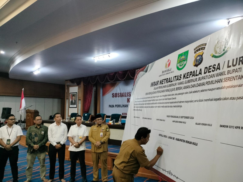 Polres Rohul dan Bawaslu Gelar Ikrar Netralitas Kepala Desa dan Lurah