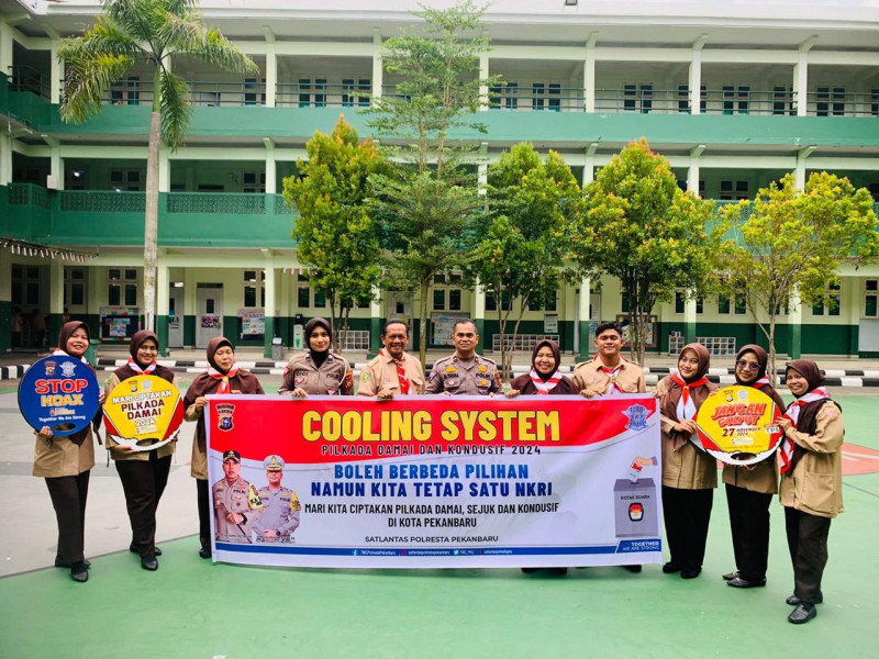 Kegiatan Cooling System Satlantas Polresta Pekanbaru di SD Al-Azhar: Edukasi Pilkada Damai kepada Guru