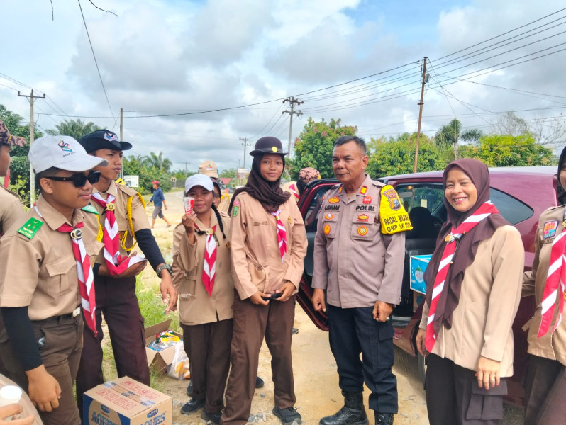 Kapolsek Rengat Barat Ajak Milenial Pramuka Gunakan Hak Pilih