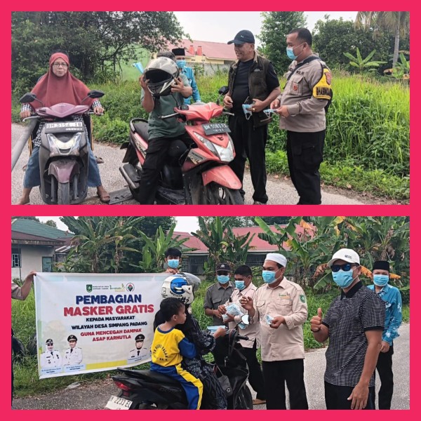 Asap Musiman Melanda Riau,  Pemdes Simpang Padang Bagikan Masker Kepada Warga