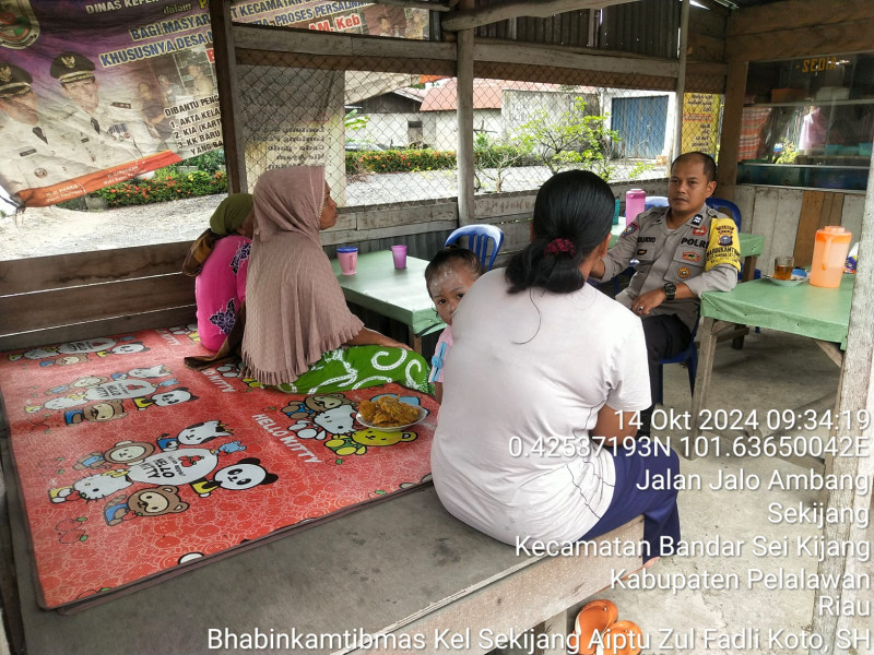 Bhabinkamtibmas Polsek Bandar Sei Kijang Gelar Kegiatan Cooling System Jelang Pilkada 2024