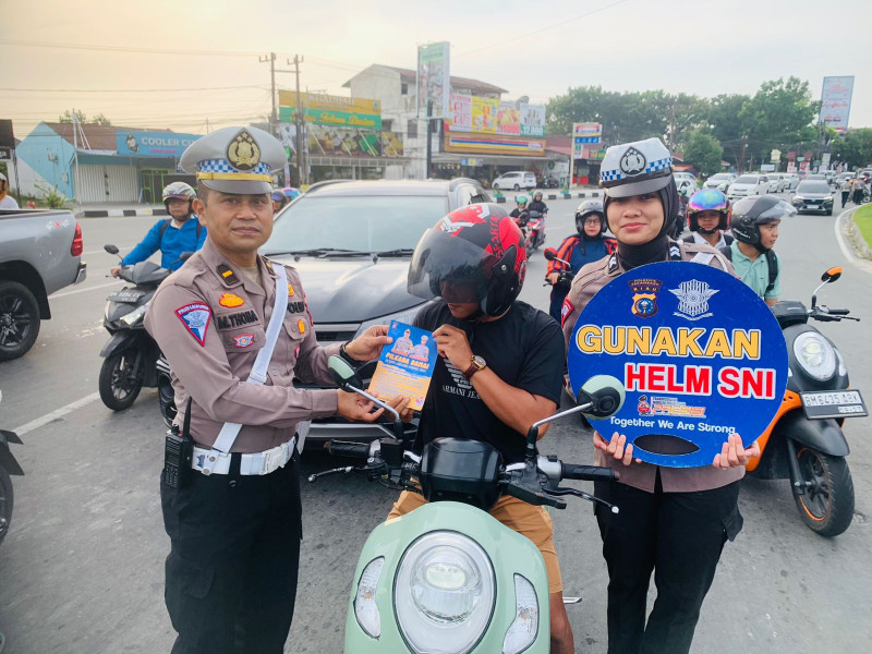 Satlanntas Polresta Pekanbaru Gencar Sampaikan Tertib Berlalu Lintas dan Pilkada Damai