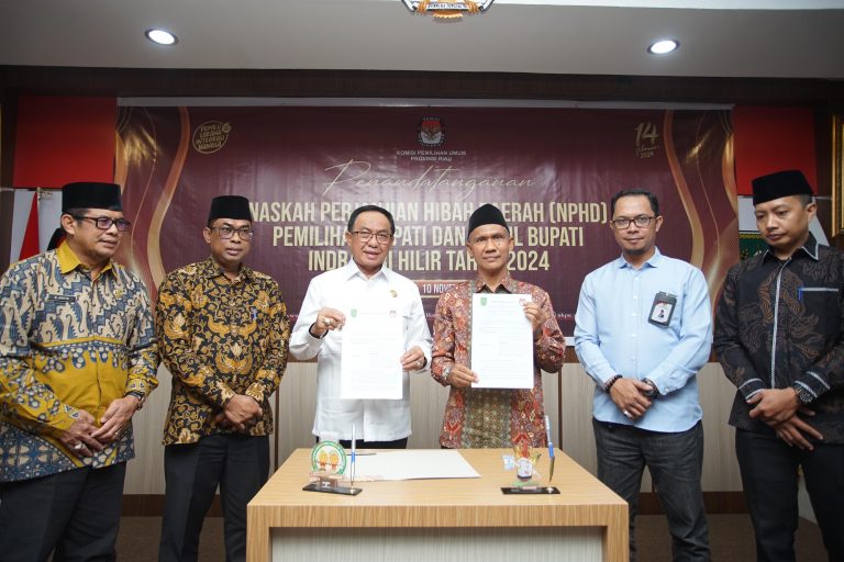 Bupati HM Wardan Bersama KPU Inhil Tandatangani NPHD Pendanaan Pilkada 2024