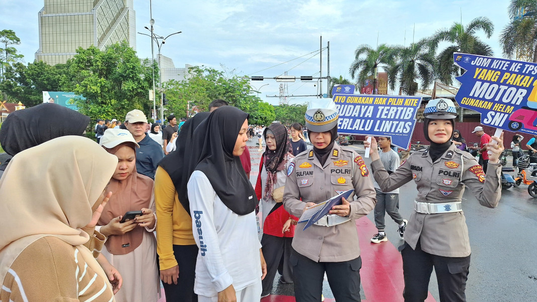 10 Hari Jelang Pilkada Riau 2024, Ditlantas Polda Riau Edukasi Pengunjung CFD Pekanbaru