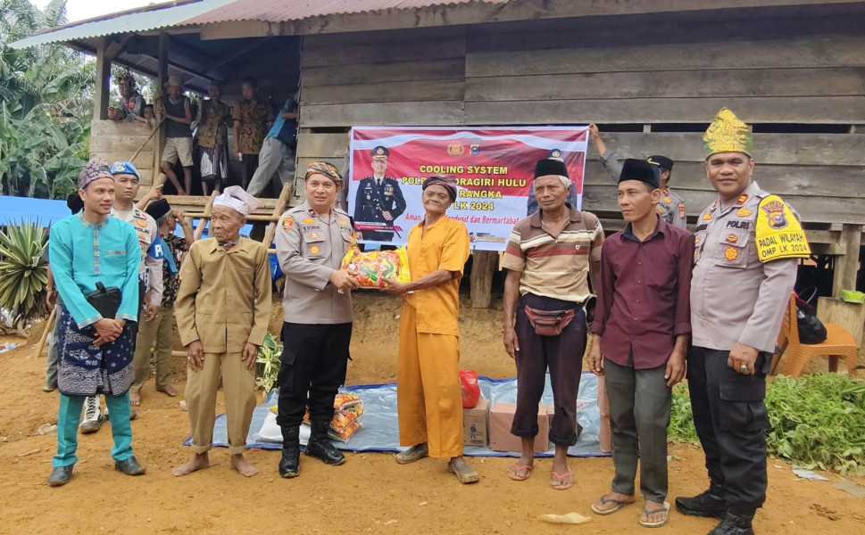 Sosialisasi Pilkada Damai Polres Inhu di Gawai Kebatin Warga Desa Talang Mamak