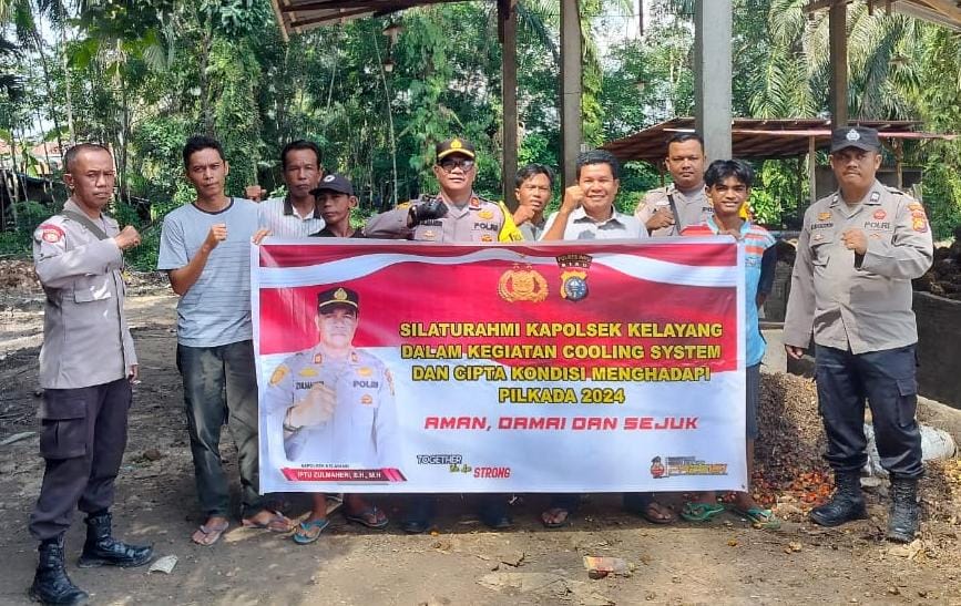 Kapolsek Kelayang Ajak Buruh Bongkar Muat Jaga Kamtibmas dan Lawan Golput