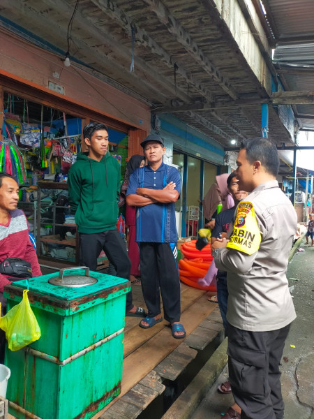 Sambangi Pasar, Personel Polsek Kuindra Ajak Ciptakan Suasana Kondusif