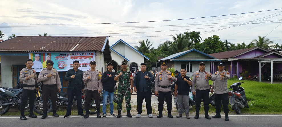 Kapolsek Tempuling Pimpin Pengamanan Kampanye Dialogis Paslon H Herman-Yuliantini